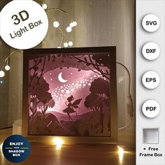 the 3d light box is shown with fairy silhouettes on it and lights behind it