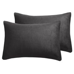 two black pillows sitting next to each other