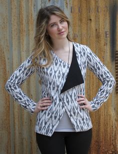 1 Jacket, 3 ways to wear it. This hand woven black and white ikat jacket features a wide open collar, a button closure and gathering in the back for a tailored look. Pair it with our ikat jogger pants or with jeans for a fresh, fun look. Fair trade. Ikat fabric. Ikat Jacket, 3 Ways To Wear, Shrug For Dresses, Ikat Dress, Cotton Blazer, Ikat Fabric, Indian Attire, Kurta Designs, Indian Designer Wear