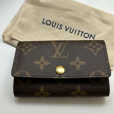 Lv 6 Rings Key Holder. New, Never Used. I Cannot See A Code In This One But I Will Make A Video Of The Item I’m Shipping So No Scammers, Item Is Original, Bought At Lv Online Store. Lv Key Pouch, Louis Vuitton Keychain, Louis Vuitton Key Pouch, Louis Vuitton Red, Key Wallet, Louis Vuitton Brown, 6 Rings, Louis Vuitton Wallet, Louis Vuitton Accessories