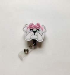 "Bulldog badge reel, dog badge reel, nurse badge reel, nursing badge reel, badge reel, retractable badge, vet Gift, Vet Tech, name badge This cute bulldog badge reel is the perfect way to add some flair to your ID badge. This design is perfect for hospital staff, teachers and students, office staff, waitresses, veterinarians, Or anyone who wears a badge. ** Optional Gift Wrapping ** Let me take the hassle out of your shopping and I will gift wrap an item or items for you. Just simply add this li Novelty Personalized White Badge Reel, White Personalized Novelty Badge Holder, Cute Personalized White Badge Reel, Nursing Badge Reel, Nursing Badge, Cute Bulldogs, Hospital Staff, Office Staff, Gold Polka Dots