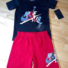 Boys 2-Pc. Jumpman Classics T-Shirt & Shorts Set Bnwts Casual-Day Comfort. A Mash-Up Of Prints Adds Cool Style To This T-Shirt And Shorts Set By Jordan. T-Shirt: Crewneck; Logo Print Chest Shorts: Elastic Waistband; Logo Print At Left Leg Solid T-Shirt: Cotton; Heathered T-Shirt/Shorts: Cotton/Polyester Machine Washable Shorts Jordan Outfits, Sporty Graphic Print Playwear Set, Sporty Graphic Print Sets For Playwear, Sporty Playwear Set With Graphic Print, Red Cotton Short Sets, Red T-shirt For Summer Playwear, Cotton Sport Sets With Graphic Print, Cotton Graphic Print Sports Sets, Casual Graphic Print Playwear Sets