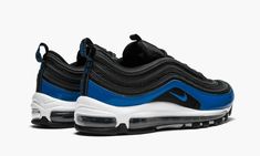 The Nike Air Max 97 has become one of the most popular sneakers on the market since being brought back in a big way in 2017 to celebrate its 20th anniversary.  This colorway originally released in 2018.  It features a black mesh upper with wavy black overlays.  A bright Blue Nebula patent leather wraps the mud guard.  The same hue also accentuates the branding on the tongue, heel tab, and side panels.  This Nike Air Max 97 sits atop a white midsole and black outsole. Air Max 97 Black And White, Nike Air Max 97 Blue, Nike 97 Air Max 97, Cool Nike Air Max 97, Nike Air Max 97 Red White And Blue, Nike Air Max 96 Ii Blackened Blue, Popular Sneakers, Nike Air Max 97, Black Mesh