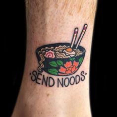 a tattoo that reads send noods on the side of a person's foot