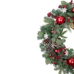 a christmas wreath with red balls and pine cones