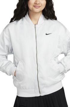 This lightweight jacket features a sporty bomber silhouette and reverses from smooth to diamond quilting, making it an essential for chilly days. Blade collar Reversible Lined, with recycled-polyester fill 100% nylon Machine wash, line dry Imported Dance Jackets, Nike Sportswear Women, Women's Windbreaker, Lightweight Jacket, Nike Sportswear, Vest Jacket, Black Fashion, Fitness Models, Active Wear