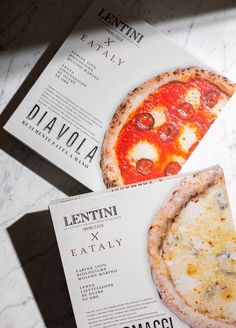 two slices of pizza sitting on top of each other next to an advertisement for lentini