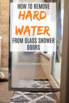 a glass shower door with the words how to remove hard water from glass shower doors