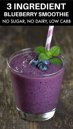 blueberry smoothie in a glass with mint leaves on top and the text 3 ingredient blueberry smoothie no sugar, no dairy, low carb