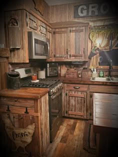 a kitchen with wooden cabinets and an old fashioned stove top oven in the middle of it