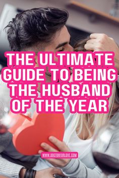 a man and woman kissing while holding a heart shaped box with the words, the ultimate guide to being the husband of the year