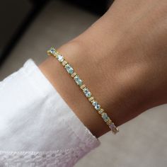 "This beautiful, vibrant tennis bracelet features alternating oval-cut aquamarine and round solitaire stones. It looks great stacked or on its own! It is a unique piece that's one-of-a-kind and beautiful!! - - - D E T A I L S  - - - * Made of 925 Sterling Silver * THICK plating of 14k Gold or Rhodium  * Available in 6.25\" or 6.75\"  or 7\" + .5\" Extension  * Lobster Clasp Closure  * Nickel-free & Hypoallergenic  * Made of Highest Grade CZ stones for an authentic Aquamarine look! Made with 100% Pure Love! ♡ Happy to answer any questions you may have! 🥰 Let's Connect! 🥰 IG: samijewels_" Aquamarine Tennis Bracelet, Jewelry Gold Bracelet, Senior Szn, Bracelet Tennis, Aquamarine Bracelet, Cz Bracelet, Chunky Earrings, Round Solitaire, Gold Armband