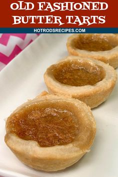 three homemade old fashioned butter tarts on a white plate with the title overlay