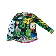 a child's long sleeved shirt with cartoon characters on it