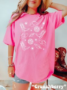 Get obsessed with the Cosmic Cowgirl Aesthetic with this cute Space Cowgirl Shirt! This Unique Comfort Colors® Tshirt is super comfy! Size up for a Trendy Oversized Look! ♥ Hello and Welcome to Meaningful Tees Shop! ♥ Models are wearing Comfort Colors® Crunchberry, Pepper and Violet ♥ All of our items are made one at a time with care for each customer : ) ♥ Please allow 3-7 BUSINESS days (usually 3-5) for your item to be created PLUS shipping time via USPS ♥ UNISEX TEES fit like a Mens Shirt on Women, but are not overly large. ♥ For a RELAXED FIT, your usual size will typically work, but please consult the Size Chart in the Listing Photos ♥ For a TRENDY OVERSIZED FIT, size up 1, 2, or 3 Sizes! (2 sizes up is most common) ♥ For a SNUG FIT, size down 1 size. ♥ When in doubt, lay your favorit Aesthetic Skater, Cosmic Cowgirl, Tailgate Shirt, Skater Vibes, Space Cowgirl, Balls Shirt, Cowgirl Aesthetic, Western Graphic Tees, Football Mom Shirts