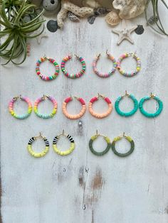 "D E T A I L S ~ Very lightweight and delicate hoop earrings with polymer clay heishi discs.  ~ Hoops are 24K Gold plated or Silver plated. S I Z E G U I D E ~ Hoops measure approximately 1 inch in diameter.  P R O D U C T I O N T I M E S ~ Every single item I sell is made to order. My current processing time is 3 - 4 weeks.  C A R E I N S T R U C T I O N S ~ In order to keep your jewelry in perfect condition, I advise not wearing your jewelry while sleeping, showering or swimming.  ~ Because these hoops are crafted by hand, they are delicate & bend easy. Please handle with care! ♥ G I F T W R A P P I N G ♥: Included at no additional cost! Just check the box \"This is a gift\" at checkout! And make sure to add a gift message so they know its from you!" Polymer Bead Earrings, Polymer Clay Beads Earrings, Western Homemade Jewelry, Flat Bead Earrings, Rubber Bead Earrings, Heishi Beads Earrings, Clay Bead Hoop Earring Ideas, Heishi Hoop Earrings, Clay Beaded Earrings