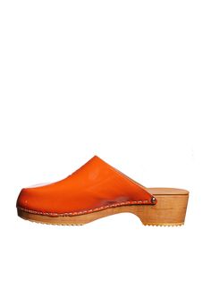 Step into luxury with these exquisite leather and wood clogs. Handmade with precision and care, these clogs feature a round tip and a 5 cm heel, adding a touch of elegance to any outfit. The wooden sole not only provides durability but also gives a nod to the natural world, making these clogs a timeless addition to your designer shoe collection. Round tip for a classic look Wooden sole for durability and style 5 cm heel for added elegance Handmade with attention to detail World Making, Wood Clogs, Leather And Wood, Designer Shoe, Clog Sandals, Handmade Leather, Natural World, Classic Looks, Shoe Collection