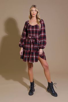 A woven plaid mini dress featuring sweetheart neckline, smocked bodice, long sleeve, self sash tie and ruffled hemline Details: Self : 50% Polyester 50% Cotton Size & Fit - Model is 5`8" And Wearing Size Small- Measurements Taken From Size Small- Approx. Length: 34" Plaid Mini Dress, Flying Tomato, Red Mini Dress, Guinea Bissau, Sweetheart Neckline, Smocking, Bodice, Fitness Models, Black And Red