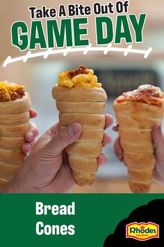 two people holding up some bread cones with toppings on them and the text take a bite out of game day