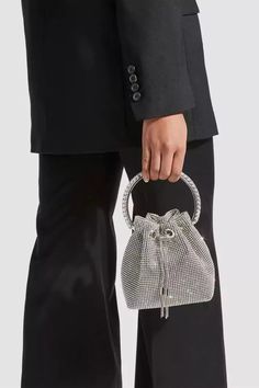 Love the Harlow Silver Crystal Embellished Bucket Bag for all occasions! This bag is made of PU material, and the surface is inlaid with hot diamonds. The chain allows you to straddle your body diagonally. The handle on the top makes it easy to carry it anywhere. This is a great accessory choice whether worn with dress Stretch Mesh Fabric, Embellished Bags, Rhinestone Clutch, Drawstring Bucket Bag, Rhinestone Decor, Shoulder Chain, Bon Bon, Elegant Accessories, Mesh Bag