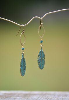 Brass feather earrings with beads, long bohemian dangles, green patina Green Bohemian Earrings With Feathers, Green Bohemian Feather Earrings, Bohemian Green Feather Earrings, Earrings Handmade Beaded, Dangle Beaded Earrings, Beading Earrings, Patina Jewelry, Earrings With Beads, Pom Crafts