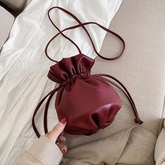 Chic Solid Color Bucket Bag With Phone Pocket, Chic Solid Color Faux Leather Bucket Bag, Versatile Faux Leather Bucket Bag, Trendy Soft Leather Pouch Bucket Bag, Leather Drawstring Pouch, Tropical Retreat, Mini Bucket Bag