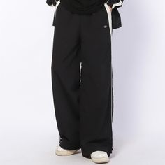 Experience the ultimate in comfort and style with our Casual Waterproof and Versatile Sweatpants. These premium sweatpants offer both casual and versatile wear, perfect for any occasion. Stay dry and stylish with the added benefit of waterproof technology. Upgrade your wardrobe with these must-have sweatpants. Features: -100% Cotton -Mid-rise Waist -Drawstring Waistband -Regular Fit -Street Style Wide Leg Sporty Sweatpants For Outdoor, Sporty Wide Leg Sweatpants For Outdoor, Sporty Wide-leg Sweatpants For Outdoor, Black Waterproof Techwear Parachute Pants, Sporty Waterproof Bottoms For Streetwear, Sporty Waterproof Black Parachute Pants, Black Waterproof Winter Pants, Functional Black Waterproof Pants, Sporty Waterproof Cargo Pants For Streetwear