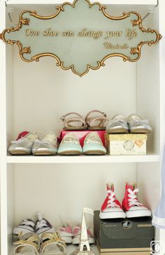 there are many pairs of shoes on the shelves