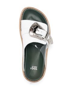 Toga Pulla two-tone Buckled Sandals - Farfetch White Leather Footbed Slip-on Sandals, White Open Toe Mules With Buckle, White Open Toe Mules With Buckle Closure, White Buckle Closure Mules For Spring, Spring White Mules With Buckle Closure, Summer Slides With Single Toe Strap And Tang Buckle, Summer Slides With Tang Buckle And Single Toe Strap, White Leather Sandals With Rectangular Buckle, Spring Slides With Rectangular Buckle Closure