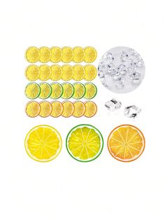 an assortment of fruit cut in half with ice cubes and lemon slices on the side