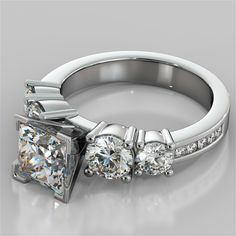 three stone diamond engagement ring with side stones