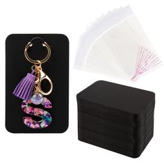 PRICES MAY VARY. Package Include: 100 x Keychain Display Cards, 100 x Self-Sealing Bags. Product Size: Each cards measures 3 x 4.7 in/7.5 x 12 cm, each clear bags measures 3.5 x 5.5 in/9 x 14 cm. Material: Our keychain place cards are made of quality art paper with pre-cut holes, which is not only sturdy, but also not easy to bend and break. These cards are thick enough to be written and not easy for ink to pass through. Unique Design: This keychain card is improved and designed by TEMLUM. We in Bags Keychain, Keychain Display, Cards Holder, Packaging Supplies, Clear Bags, Pet Tags, Bag Holder, Display Cards, Jewelry Packaging