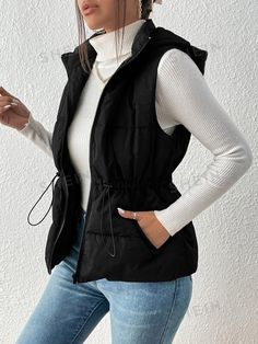 Details:Zipper \nStyle:Casual \nDetails:Drawstring \nPlacket:Zipper \nType:vest \nNeckline:Hooded \nColor:Black \nPattern Type:Plain \nSleeve Length:Sleeveless \nLength:Regular \nFit Type:Regular Fit \nFabric:Non-Stretch \nFilling:100% Polyester \nMaterial:Fabric \nComposition:55% Polyamide \nComposition:45% Polyester \nTemperature:Late Fall (10-17℃/50-63℉) \nCare Instructions:Hand wash or professional dry clean \nSheer:No \n Vest Puffer, Outerwear Women Winter, Zipper Vest, Hooded Vest, Winter Coats, Winter Coats Women, Casual Coat, Black Casual, Outerwear Women