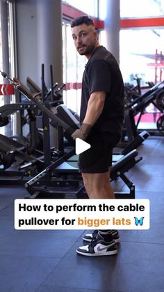 a man standing in front of a row of gym equipment with the words how to perform the cable pullover for bigger fats