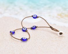 It is said when a person wears an evil eye it will guard them against misfortune and ward off evil forces. The Tula Blue evil eye anklet will bring you nothing but good karma, good vibes, and a cute look that you can rock anywhere! Playfully dainty, our Princess Collection is perfect for any occasion. (No, seriously— the first ever Princess necklace was designed for a bride!) Wear your Princess anklet on its own for a minimalist moment, or layer it with others for a bold statement. You'll be say Evil Eye Anklet, Princess Necklace, Puka Shell, Good Karma, Versatile Jewelry, Princess Collection, Eye Glass, Blue Evil Eye, Bride Wear