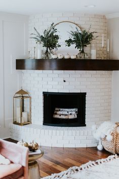 a living room filled with furniture and a fire place in the middle of the room