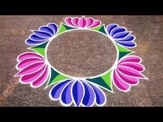 a colorful flower design on the ground