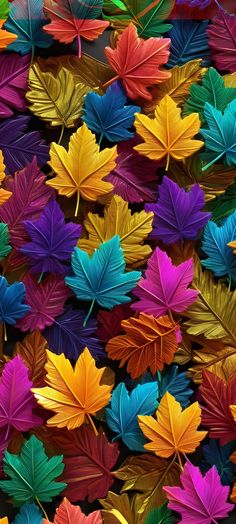 many colorful leaves are arranged together