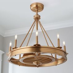 a chandelier hanging from the ceiling in a room