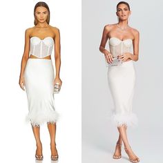 two women in white dresses and one is wearing a feathered skirt with an embellished bustier