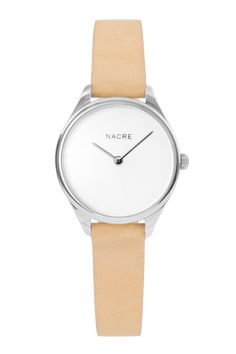 A minimal, modernist watch with a soft white, pearlized dial. Paired with a vegetable-tanned, Italian leather band. Minimal Watch, Minimalist Watch, Saddle Leather, Stainless Steel Mesh, Telling Time, Steel Mesh, Navy Leather, Matte Gold, Soft White