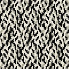 an abstract black and white pattern on fabric