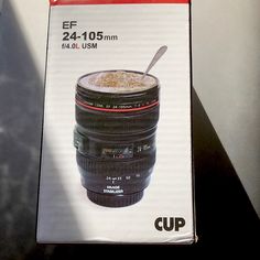 a box with a coffee cup on top of it