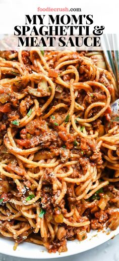 a plate full of spaghetti and meat sauce with the title overlay reads my mom's spaghetti and meat sauce