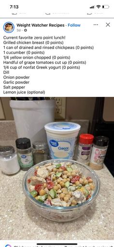 a bowl filled with food sitting on top of a counter next to an ice cream container