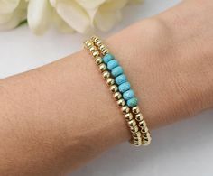 Purify your everyday with this stunning Turquoise gemstone + 14kt gold fill beaded bracelet. A perect addition to your favorite summer stack [Turquoise is a purification stone. It dispels negative energy and can be worn to protect against outside influences or pollutants in the atmosphere. Turquoise balances and aligns all the chakras, stabilizing mood swings and instilling inner calm]. Shop our matching turquoise threaders "Imagine" 5mm faceted roundelle Turquoise gemstone beads 4mm gold fill s Everyday Wear Jewelry, Day Dreaming, Mood Swings, Bead Stringing, Cord Bracelets, Bracelet Collection, Gold Filled Jewelry, Turquoise Gemstone, Bracelet Stack