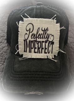 Perfectly Imperfect  Low profile cap Distressed 60% cotton, 40% polyester  Velcro adjustable back Pre curved visor  Mesh back One size fits most, but it is a firm fitting Adjustable Distressed Baseball Cap With Curved Visor, Black Distressed Dad Hat One Size, Distressed Black Trucker Hat For Streetwear, Distressed Black Dad Cap, Adjustable Distressed Black Dad Hat, Black Distressed Hat With Curved Visor, Adjustable Distressed Trucker Hat Baseball Cap, Black Distressed Dad Hat Baseball Cap, Distressed Black Dad Hat Baseball Cap