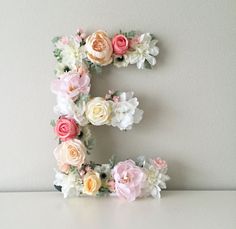 the letter e is made up of flowers