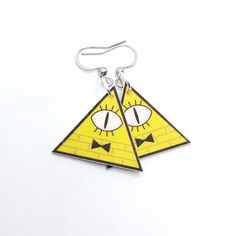 "Lightweight earrings of Bill Cipher from Gravity Falls Image is on both sides of earrings Supplied with silicone stoppers to avoid losing of earrings Each piece is uniquely hand-made - in comparison to pictures, slight variations in shape, size and color may occur (please note that the two pieces in a pair are not absolutely identical) Additionally, your screen may display colors slightly differently from their actual appearance MATERIAL: Main parts of earrings are made of polymer clay Ear wires are made of common metal or surgical steel (please select your option) Other jewelry components are silver plated copper wire The earrings are supplied with silicone stoppers to avoid losing of earrings SIZE: Bill Cypher - triangle: width: 2.8 cm (1.10\") hight: 2.5 cm (0.98\") Whole earrings: len Bill Cipher Makeup, Halloween Costumes Bill Cipher, Novelty Drop Earrings, Gravity Falls Jewelry, Bill Cipher Earrings, Novelty Metal Earrings With Ear Wire, Gravity Falls Keychain, Novelty Drop Earrings, Pierced, Crazy Earrings