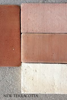 three different colored bricks laying next to each other